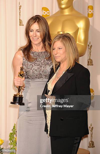 Director Kathryn Bigelow and winner of Best Director award for 'The Hurt Locker' with presenter Barbra Streisand at pose in the press room at the...