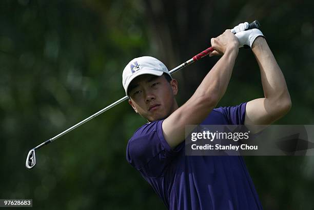 Eric Chun of South Korea watches his tee shot on the 4th hole during Asian International Final Qualifying for The Open at Saujana Golf and Country...