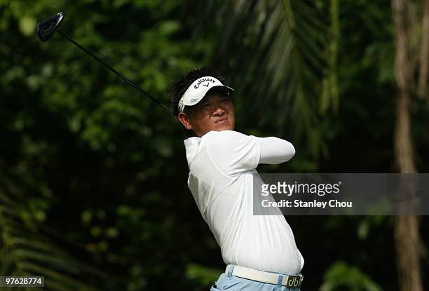 Danny Chia of Malaysia watches his tee shot on the 4th hole during Asian International Final Qualifying for The Open at Saujana Golf and Country Club...