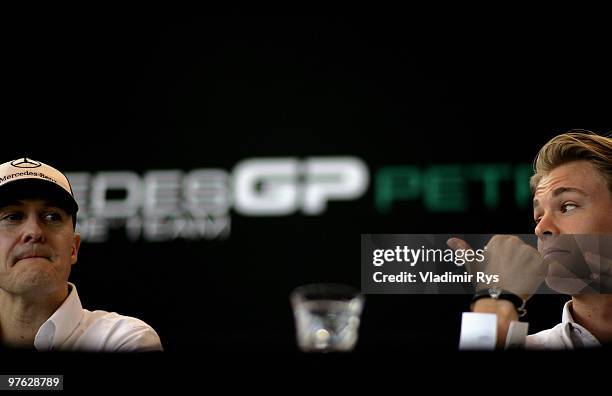 Michael Schumacher of Germany and Mercedes GP and Nico Rosberg of Germany and Mercedes GP appear at a media breakfast press conference on March 11,...