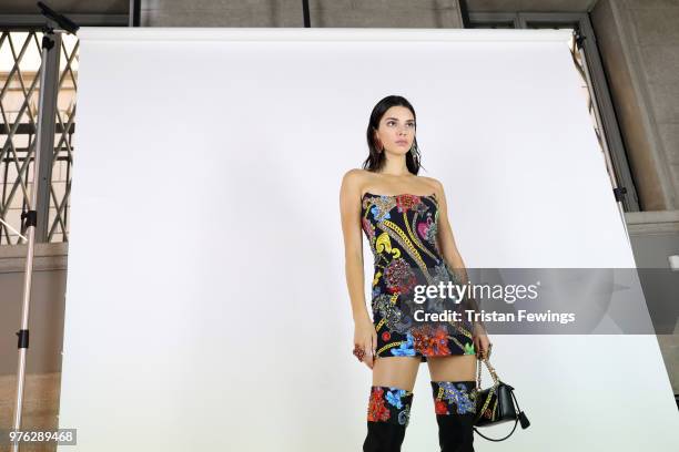 Kendall Jenner is seen backstage ahead of the Versace show during Milan Men's Fashion Week Spring/Summer 2019 on June 16, 2018 in Milan, Italy.