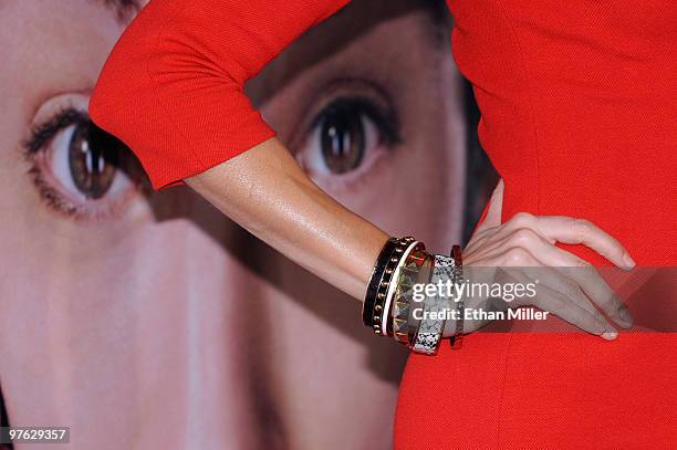 Actress Stacy Keibler arrives in front of a poster of actor Jay Baruchel at the Las Vegas premiere of "She's Out of My League" at the Planet...