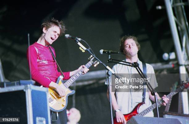 Matt Bellamy and Chris Wolstenholme of Muse perform on stage at the Glastonbury Festival on June 25th, 2000 in Glastonbury, England.