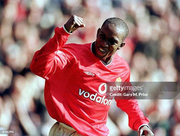 Dwight Yorke of Man Utd celebrates after scoring his second goal during the FA Carling Premiership match between Manchester United and Arsenal at Old...
