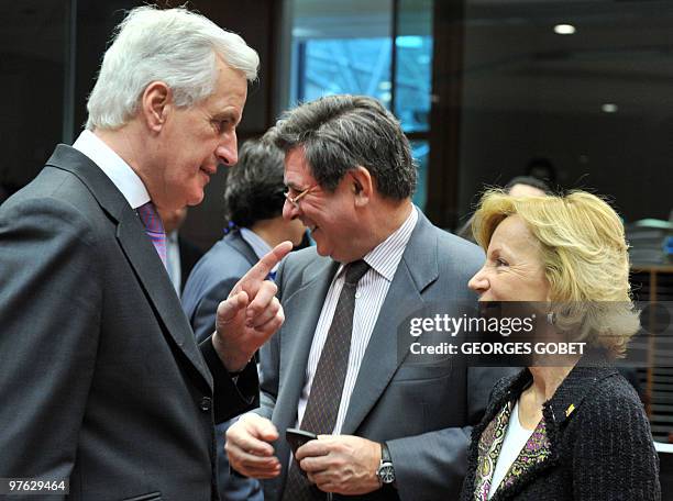 Commissioner for Internal Market and Services Michel Barnier speaks with Spanish Finance Minister Elena Salgado as he welcomes her prior to a meeting...