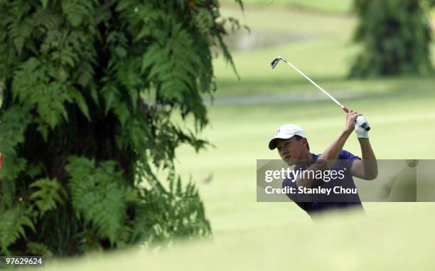 Eric Chun of South Korea drives out of the rough on the 6th hole during Asian International Final Qualifying for The Open at Saujana Golf and Country...