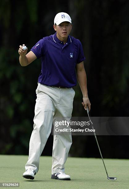 Eric Chun of South Korea celebrates after sinking a birdie on the 9th hole during Asian International Final Qualifying for The Open at Saujana Golf...