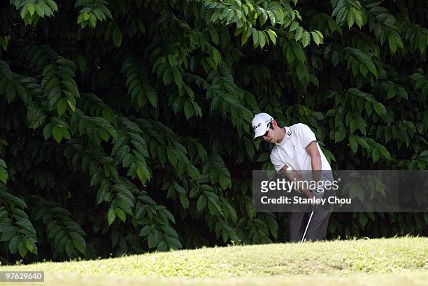 Noh Seung-Yul of South Korea plays a bunker shot on the 5th hole during Asian International Final Qualifying for The Open at Saujana Golf and Country...