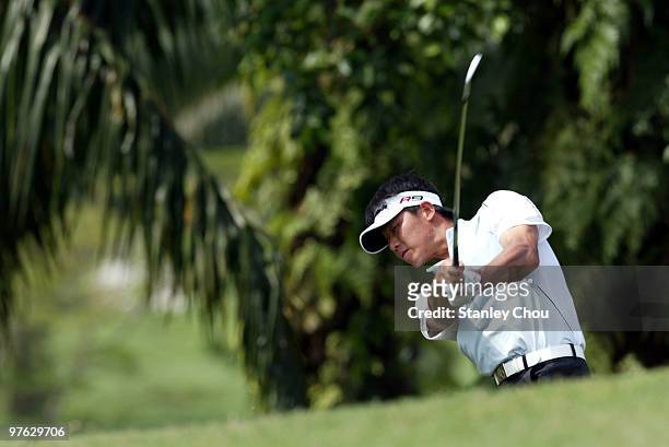 Shun Wu of China hits his 2nd shot on the 6th hole during Asian International Final Qualifying for The Open at Saujana Golf and Country Club on March...
