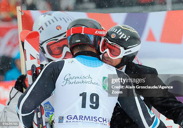 Marco Buechel of Liechtenstein celebrates his last race of his career with Aksel Lund Svindal of Norway during the Audi FIS Alpine Ski World Cup...