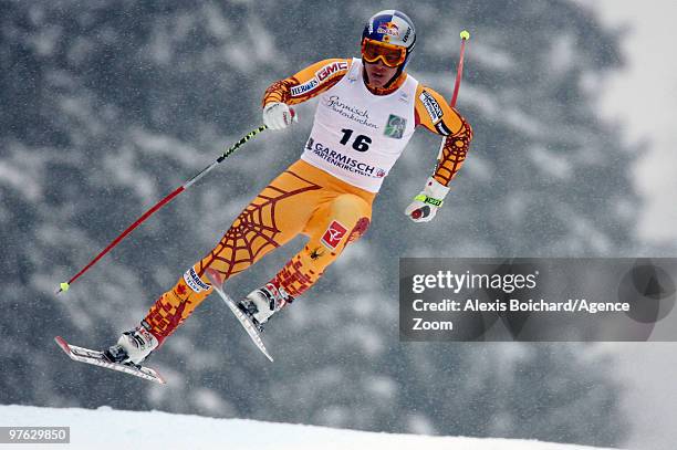 Erik Guay of Canada who takes the globe for the overall World Cup Super G competes during the Audi FIS Alpine Ski World Cup Men's Super G on March...