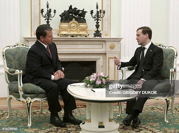 Russia's President Dmitry Medvedev speaks with King Abdullah II of Jordan during their meeting in Moscow's Kremlin on March 11, 2010. King Abdullah...