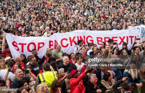 Banner is held up before Labour party leader Jeremy Corbyn speaks to crowd on the main stage at Labour Live, White Hart Lane, Tottenham on June 16,...