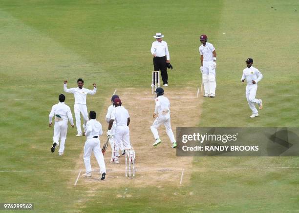 Akila Dananjaya of Sri Lanka celebrates the dismissal of Devon Smith of West Indies during day 3 of the 2nd Test between West Indies and Sri Lanka at...