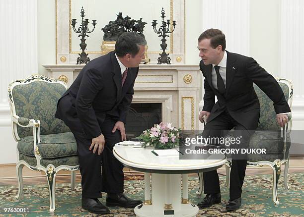 Russia's President Dmitry Medvedev and King Abdullah II of Jordan sit down for talks during their meeting in Moscow's Kremlin on March 11, 2010. King...