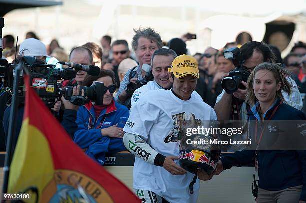 Hiroshi Aoyama of Japan and Scot Racing 250cc celebrates victory in the 250cc world championship after the MotoGP of Valencia the Valencia Circuit on...