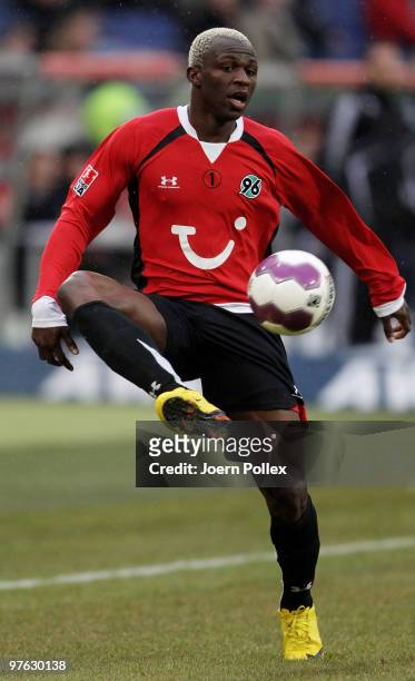 Arouna Kone of Hannover plays the ball during the Bundesliga match between Hannover 96 and VfL Wolfsburgat AWD-Arena on February 28, 2010 in Hanover,...