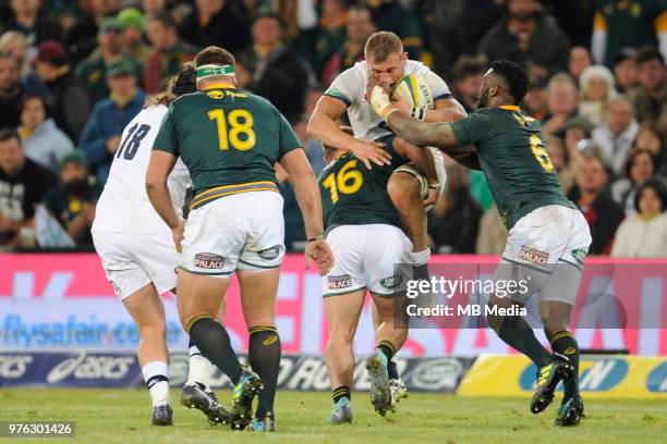 Brad Shields of England tackled back by Akker van der Merwe and Siya Kolisi of the Springboks during the second test match between South Africa and...