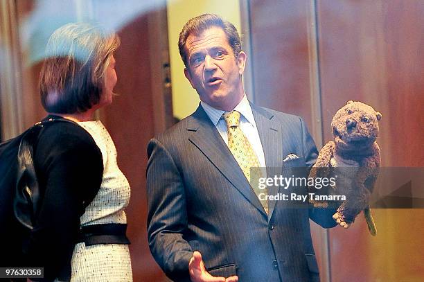 Actors Cherry Jones and Mel Gibson film scene on location at "The Beaver" film set at Rockefeller Plaza on October 12, 2009 in New York City.