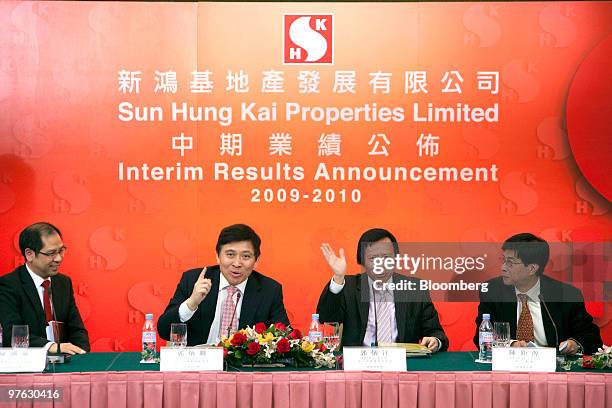 Executives of Sun Hung Kai Properties Ltd., left to right, Patrick Chan, chief financial officer, Raymond Kwok, vice chairman, Thomas Kwok, vice...