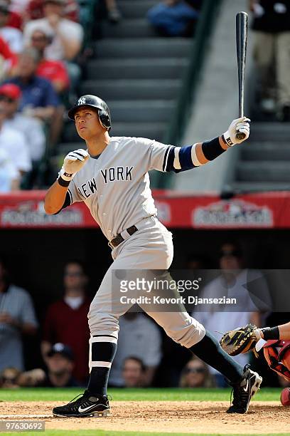 Alex Rodriguez of the New York Yankees hits a home run during the forth inning off Jered Weaver of the Los Angeles Angels of Anaheim in Game Three of...