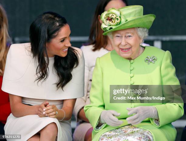 Meghan, Duchess of Sussex and Queen Elizabeth II attend a ceremony to open the new Mersey Gateway Bridge on June 14, 2018 in Widnes, England. Meghan...