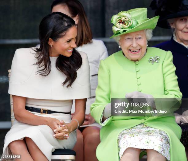 Meghan, Duchess of Sussex and Queen Elizabeth II attend a ceremony to open the new Mersey Gateway Bridge on June 14, 2018 in Widnes, England. Meghan...