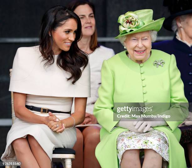 Meghan, Duchess of Sussex and Queen Elizabeth II attend a ceremony to open the new Mersey Gateway Bridge on June 14, 2018 in Widnes, England. Meghan...