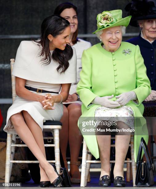 Meghan, Duchess of Sussex and Queen Elizabeth II attend a ceremony to open the new Mersey Gateway Bridge on June 14, 2018 in Widnes, England. Meghan...