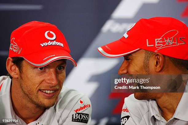 Current F1 World Champion Jenson Button of Great Britain and McLaren Mercedes and team mate and Lewis Hamilton of Great Britain and McLaren Mercedes...