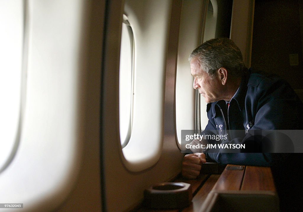 US President George W. Bush looks out th