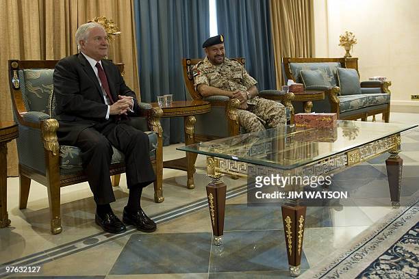 Defence Secretary Robert Gates meets with Emirati Deputy Chief of Staff, Major General Ali al-Kaabi , upon his arrival at Al-Dhafra Air Base in Abu...