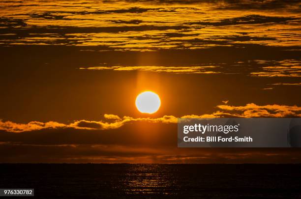 partial solar eclipse - solar eclipse in canada stock pictures, royalty-free photos & images