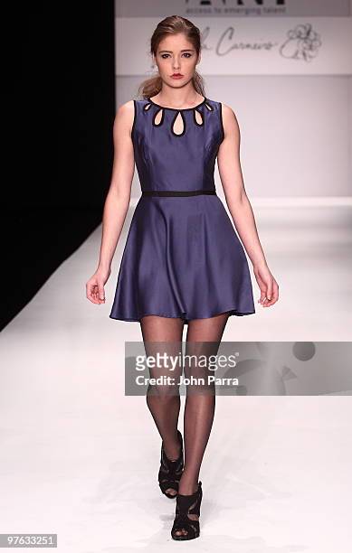 Model walks the runway at the Fernanda Carneiro show during the Gen Art 6th Annual Fresh Faces in Fashion Show during the opening of FASHIONmiami at...