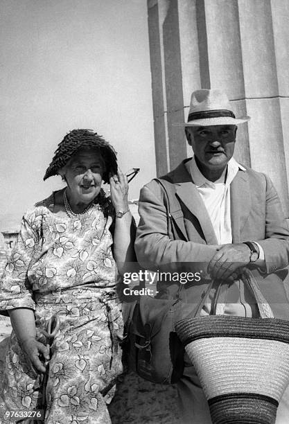 English writer Dame Agatha Christie and her husband Max E. L. Mallowan, smile 30 August 1958 while visiting the Acropolis in Athens. Agatha Christie,...