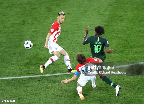 Alex Iwobi of Nigeria tackles Luka Modric of Croatia during the 2018 FIFA World Cup Russia group D match between Croatia and Nigeria at Kaliningrad...