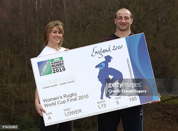 Steve Borthwick, the England captain holds a giant ticket to promote the Womens World Cup with Catherine Spencer, the England Women's captain at...