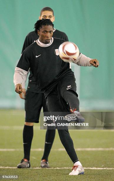 Fulham's Nigerian midfielder Dickson Etuhu attends a training session at the Juventus headquarters on March 10, 2010 in Vinovo, west of Turin, on the...