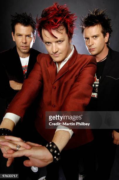 Scott Owen, Chris Cheney and Andy Strachan of The Living End pose for a group portrait on 9th February 2006 in Melbourne, Australia.