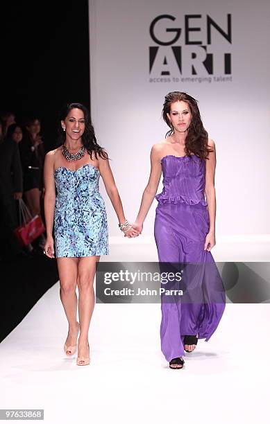 Romina Heighes and a model walk the runway at the Romina Heighes show during the Gen Art 6th Annual Fresh Faces in Fashion Show during the opening of...