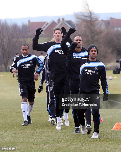 Wayne Routledge of Newcastle leads the line during a Newcastle United training session at the Little Benton training ground on March 11, 2010 in...