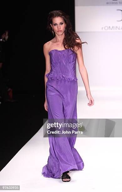 Model walks the runway at the Romina Heighes show during the Gen Art 6th Annual Fresh Faces in Fashion Show during the opening of FASHIONmiami at...