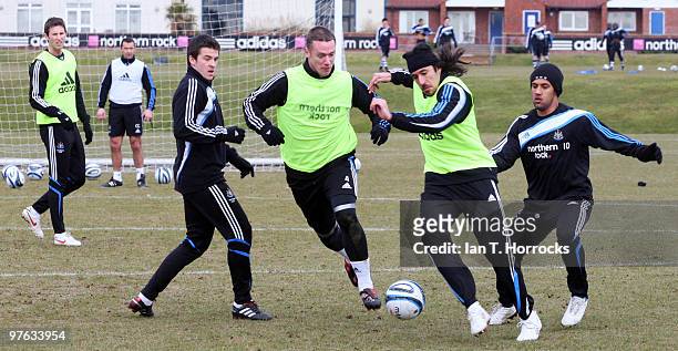 Joey Barton, Kevin Nolan, Jonas Gutierrez and Wayne Routledge of Newcastle in action during a Newcastle United training session at the Little Benton...