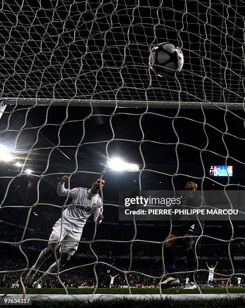 Real Madrid's Argentinian forward Gonzalo Higuain celebrates after teammate Real Madrid's Portuguese forward Cristiano Ronaldo scored against...