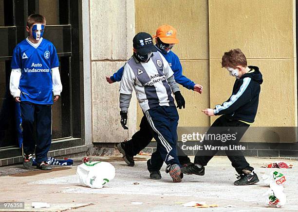 Young Birmingham fans play can football in the shadow of the Millennium Stadium before the match between Birmingham City and Liverpool in the...
