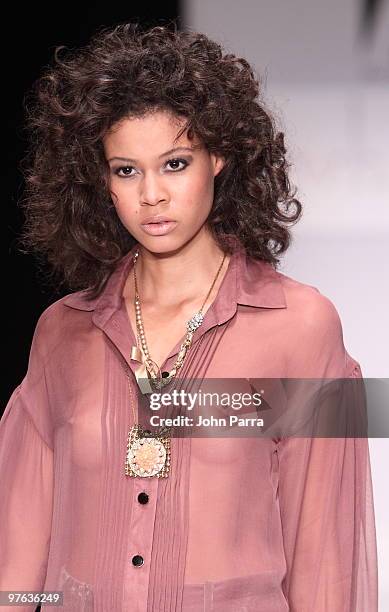 Model walks the runway at the Whitney Eve Port show during the Gen Art 6th Annual Fresh Faces in Fashion Show during the opening of FASHIONmiami at...