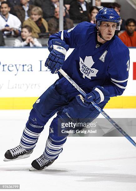 Dion Phaneuf of the Toronto Maple Leafs skates during the game against the Boston Bruins on March 9, 2010 at the Air Canada Centre in Toronto,...