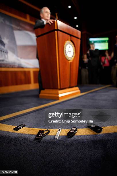 With reporters' recorders on the edge of the stage, Senate Banking Committee member Sen. Bob Corker holds a news conference at the U.S. Capitol March...