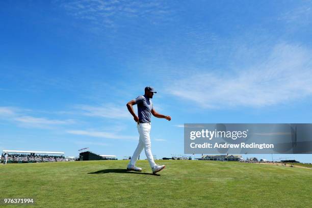 Tony Finau of the United States walks on the 18th green during the third round of the 2018 U.S. Open at Shinnecock Hills Golf Club on June 16, 2018...