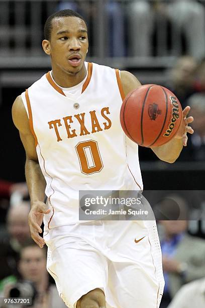 Avery Bradley of the Texas Longhorns moves the ball against the Iowa State Cyclones during the first round game of the 2010 Phillips 66 Big 12 Men's...